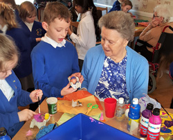 A cracking time was had by care home residents and school pupils during an Easter egg decorating session.